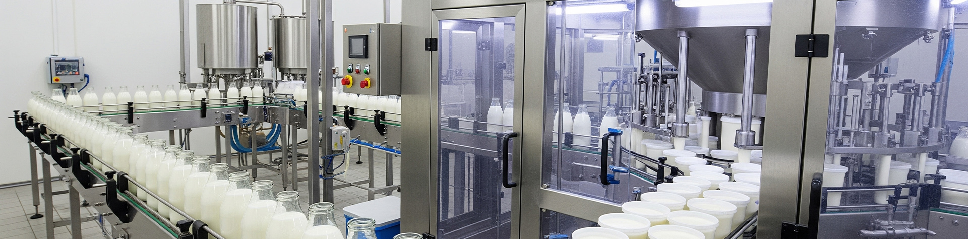 Dairy plant process area with ozone sterilizing for clean milk packaging.